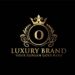 Gold emblem with a crown and ornate design surrounding a large O on a black background. Below, the text reads Luxury Brand with Your Slogan Goes Here in smaller letters.
