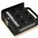 A black Whirlwind Press Box 6 with six numbered XLR output ports, a metal handle, and a labeled panel, used for audio signal distribution.